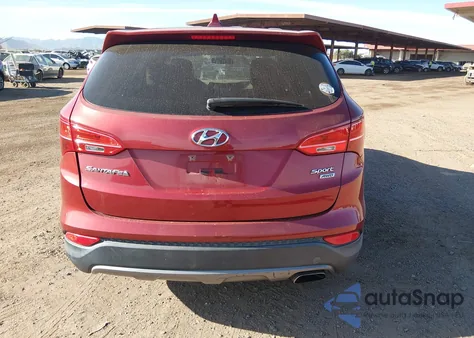 2015 Hyundai Santa Fe Sport 2.4L z USA, uszkodzony, nr VIN 5XYZTDLB0FG277236